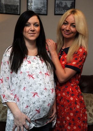 Jane Kassim (R) along with cousin Amy Bellamy who has volunteered to be a surrogate mother for Jane and is now expecting twins